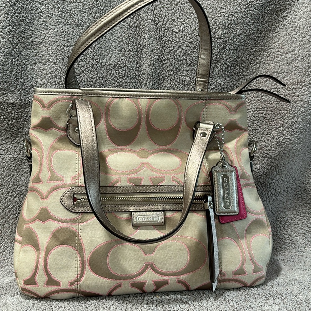 Tan and metallic pink coach purse